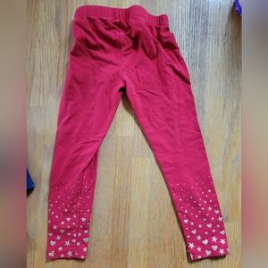 Red 3T pants with gold sparkle heart and stars